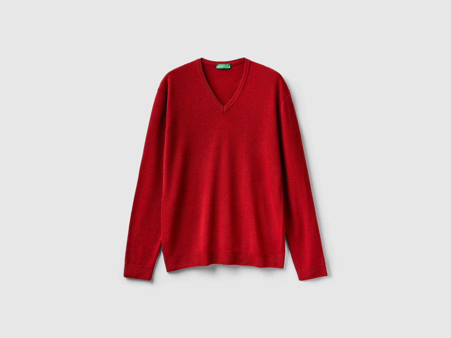 Maglia scollo a V in pura lana Merino da uomo bordeaux | Benetton Outlet