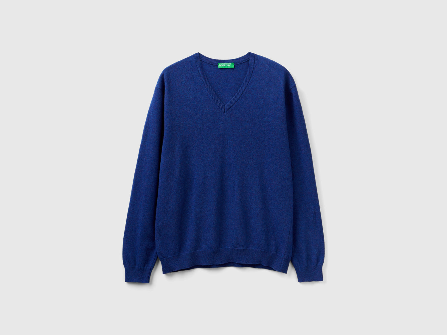 Maglia scollo a V in pura lana Merino da uomo blu | Benetton Outlet