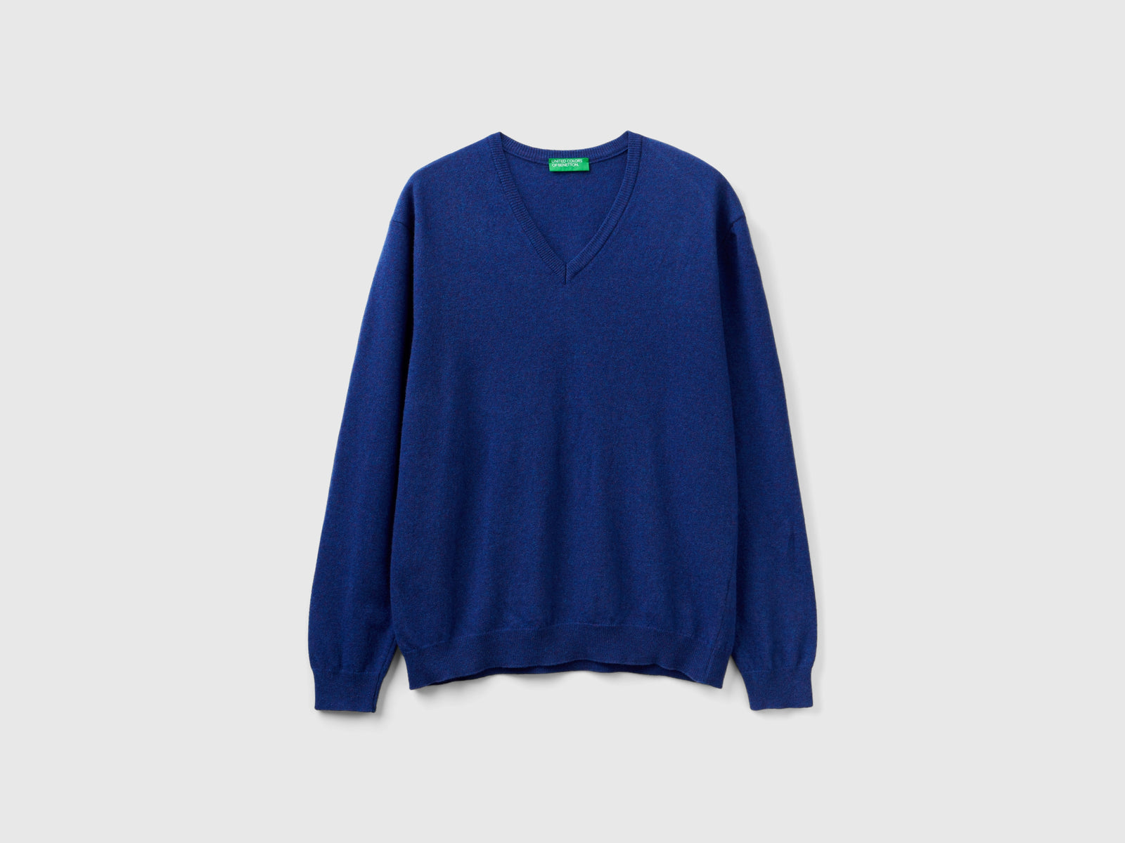 Maglia scollo a V in pura lana Merino da uomo blu | Benetton Outlet
