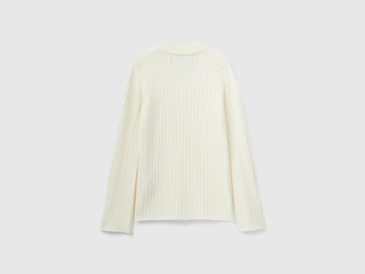 Maglia lupetto con spacchi