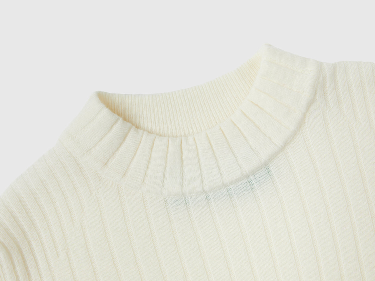 Maglia lupetto con spacchi