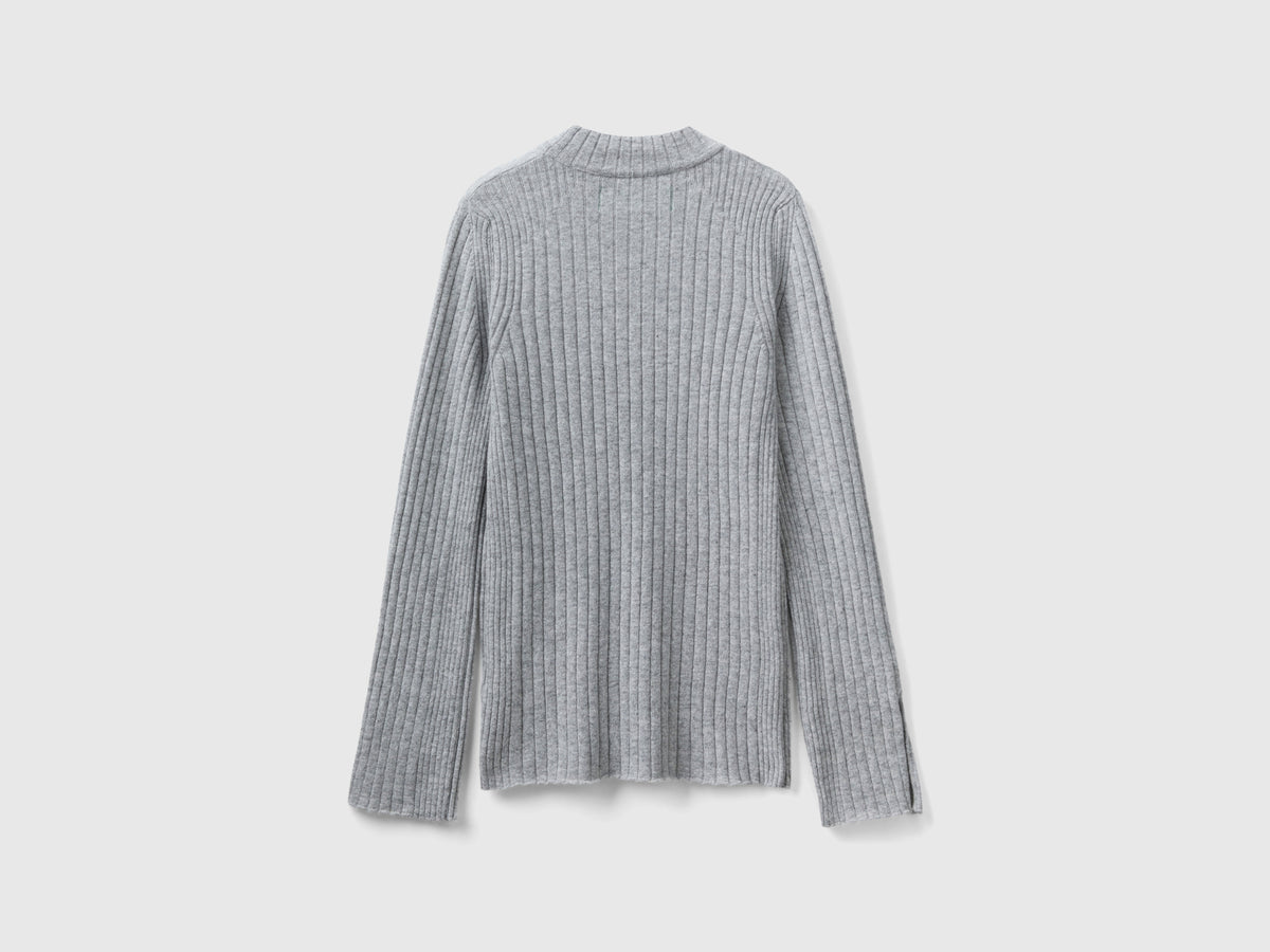 Maglia lupetto con spacchi