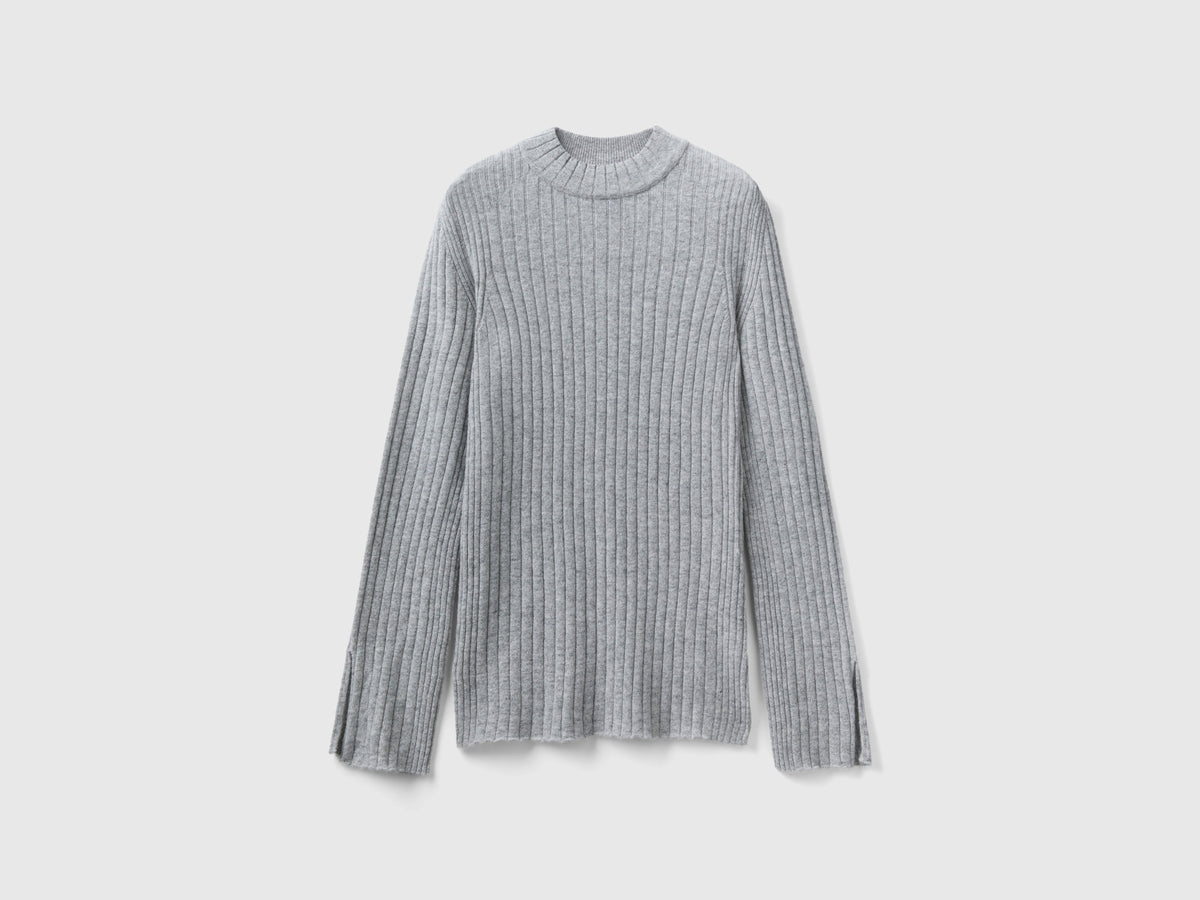Maglia lupetto con spacchi