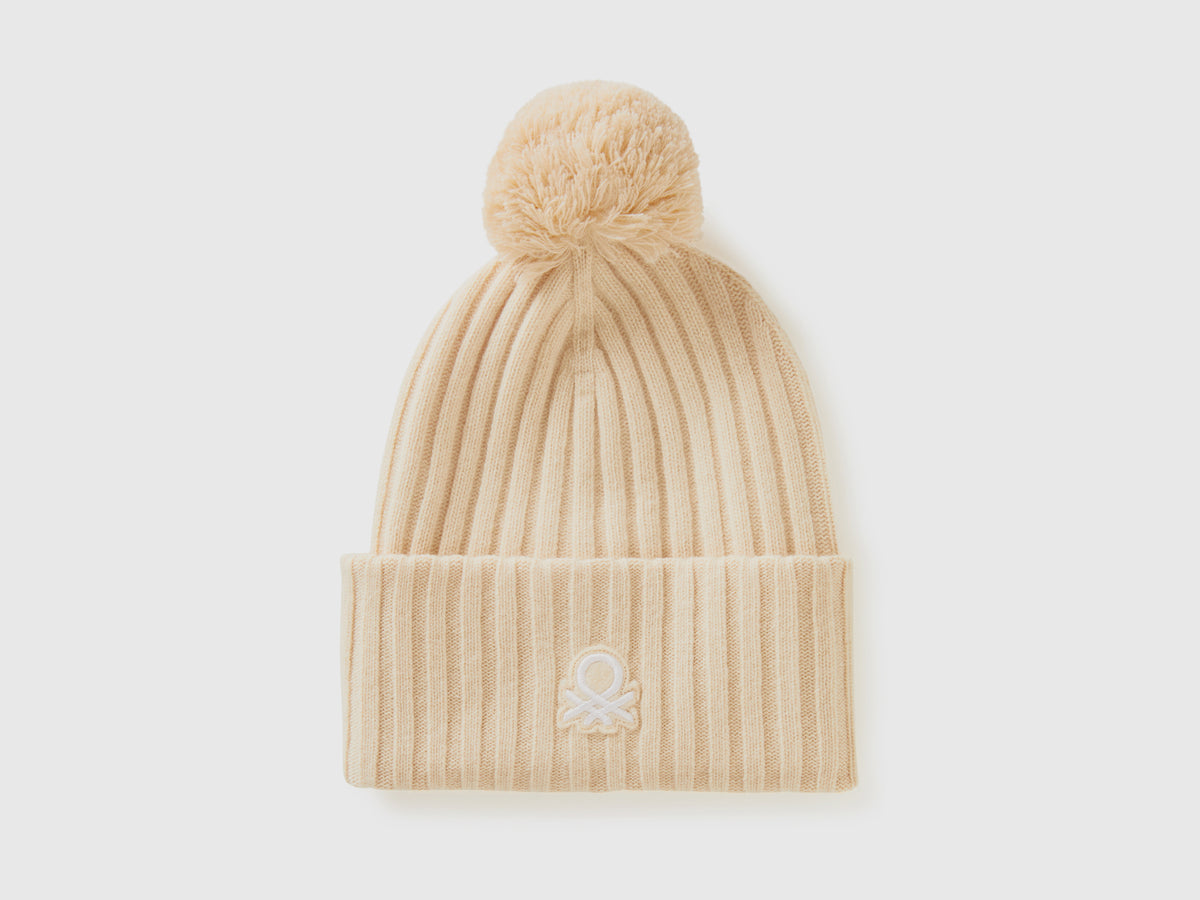 Beanie with logo and pom pom
