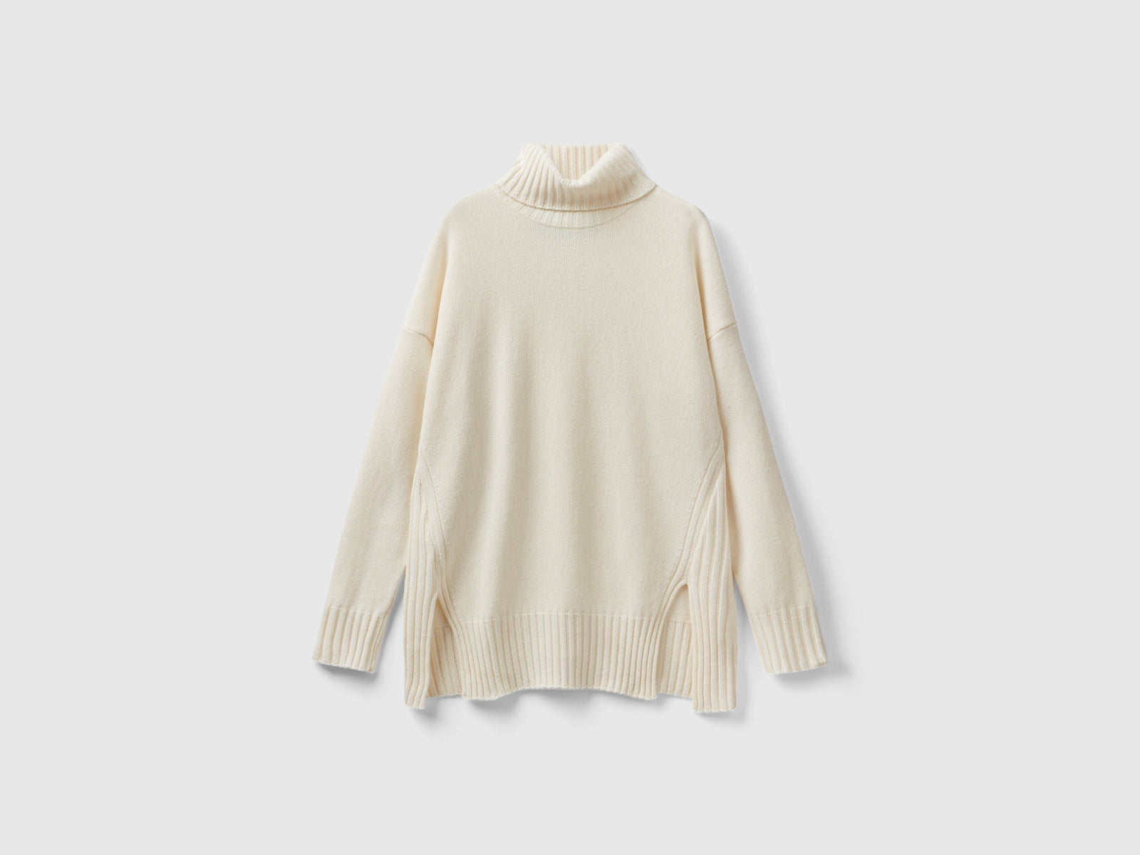 Dolcevita con spacchi da donna bianco panna | Benetton Outlet