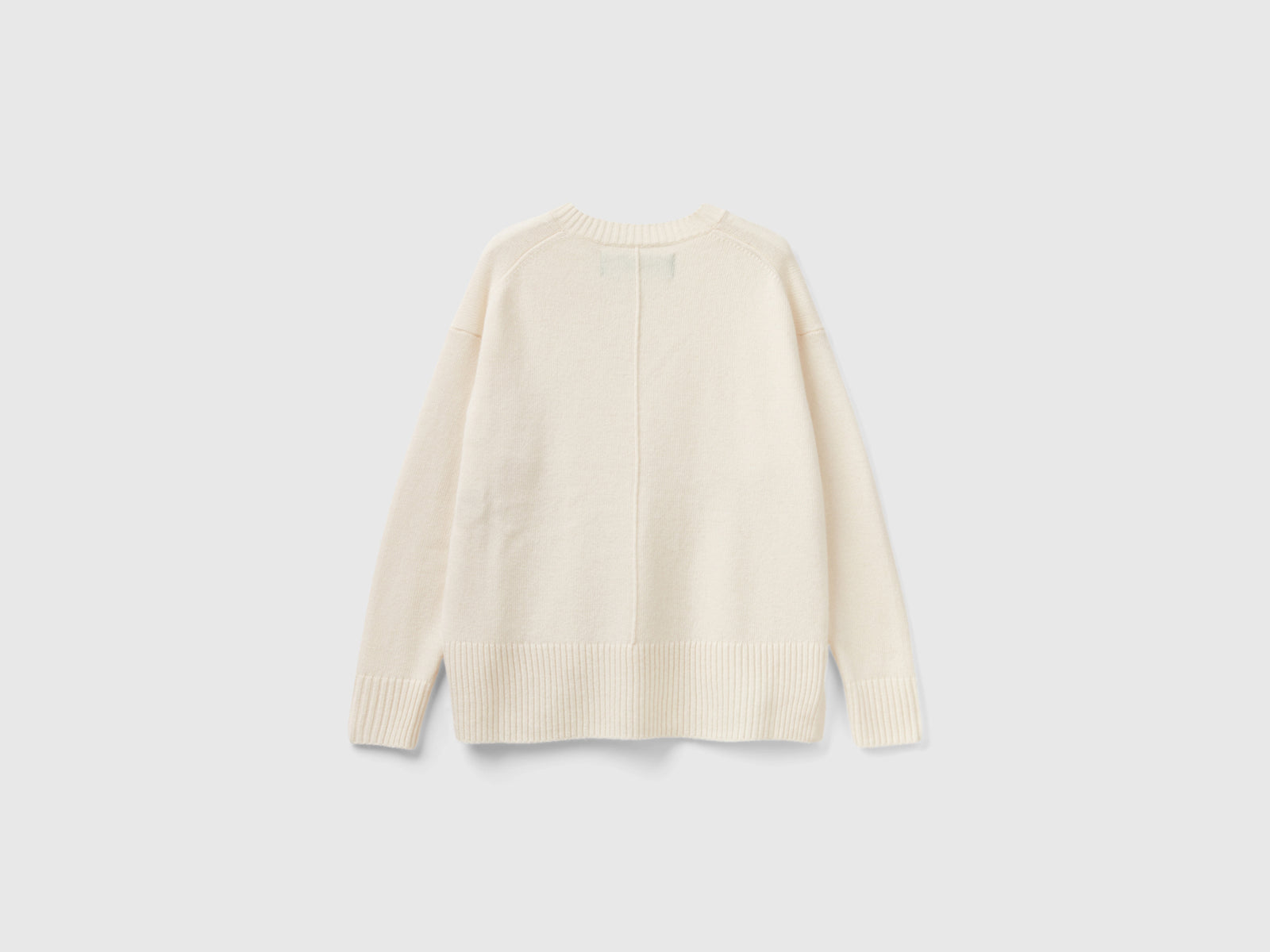 Maglione over fit con spacchi da donna bianco panna 2 | Benetton Outlet
