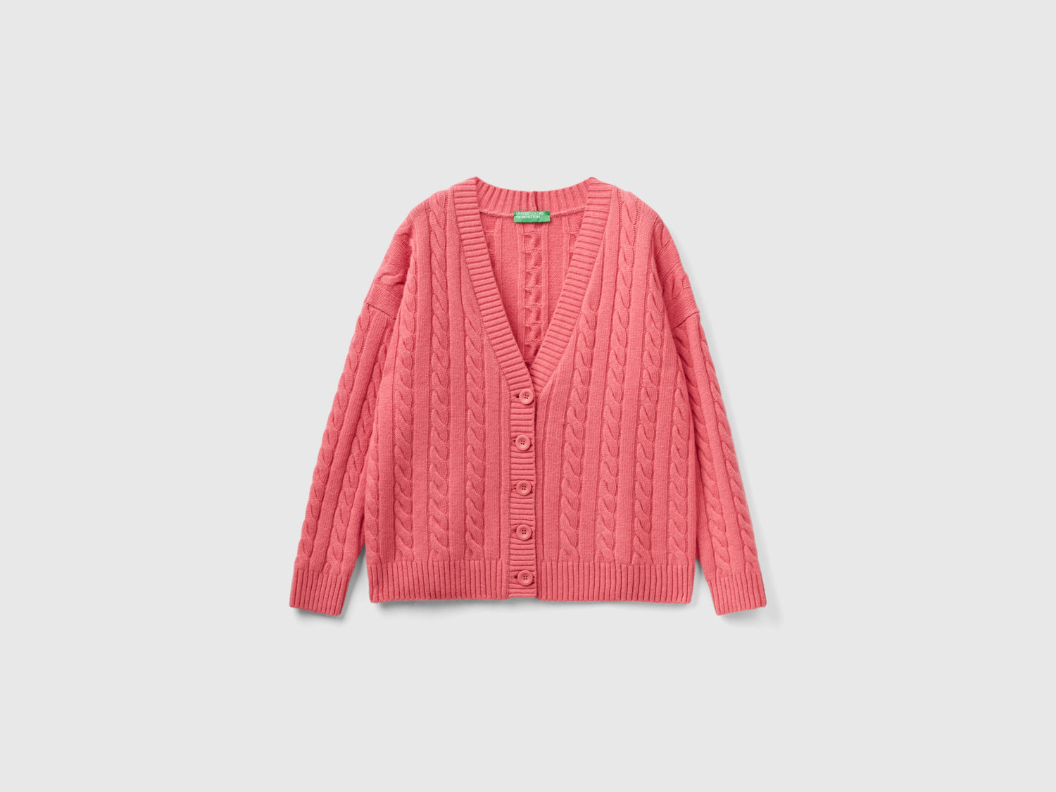 Oversized cardigan with braids da donna rosa | Benetton Outlet