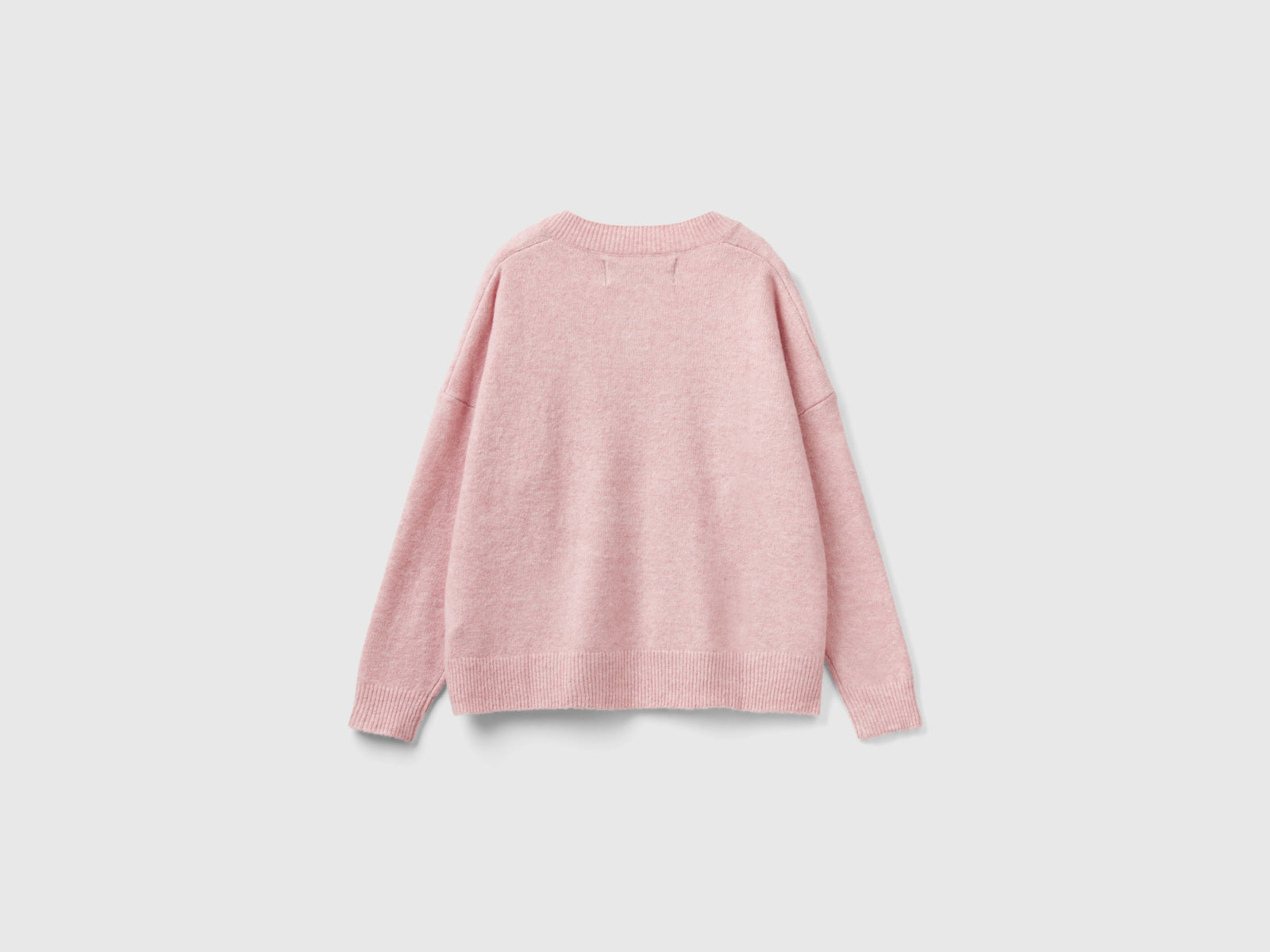 Maglia scollo a V in filato riciclato da donna rosa tenue 2 | Benetton Outlet