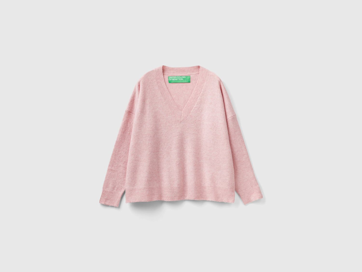 Maglia scollo a V in filato riciclato da donna rosa tenue | Benetton Outlet