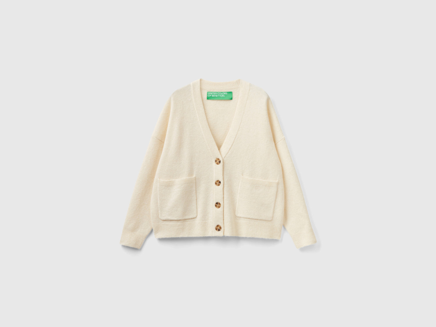 Cardigan over in filato riciclato da donna bianco panna | Benetton Outlet