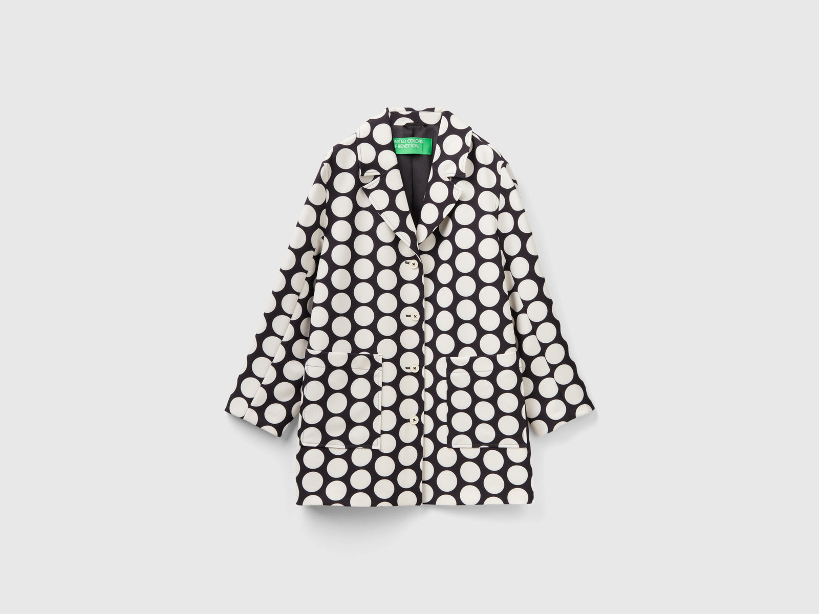 Cappotto con stampa a pois da donna nero | Benetton Outlet