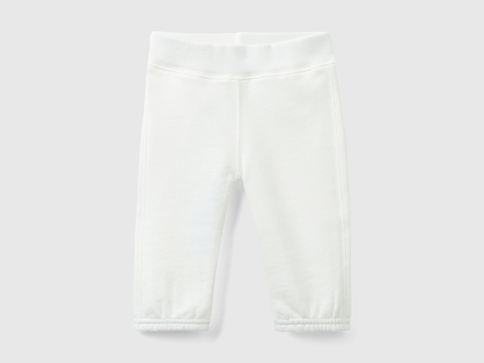 Pantalones de chándal de algodón orgánico da neonato bianco panna | Benetton Outlet