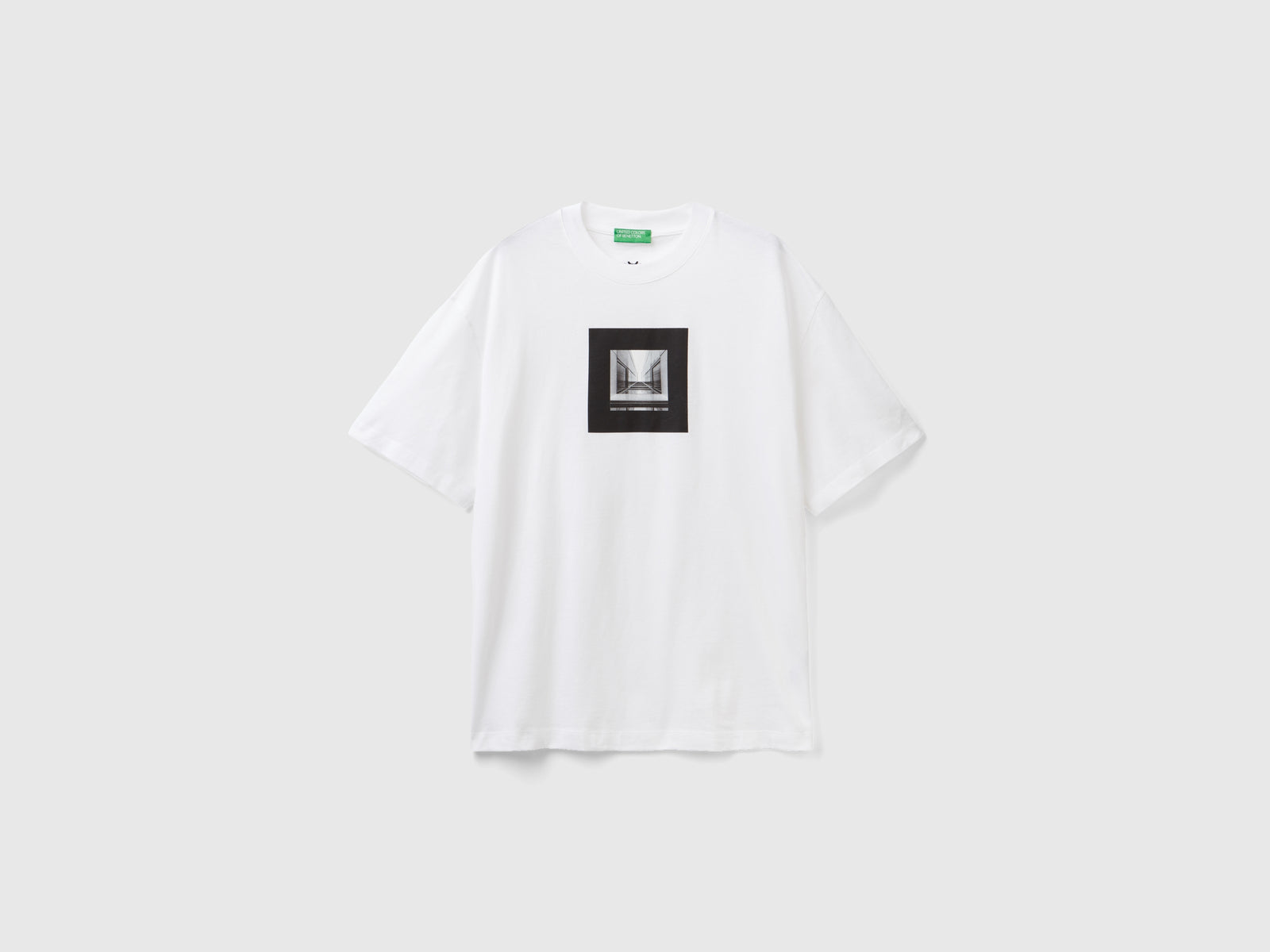Maglietta boxy fit con stampa da uomo bianco | Benetton Outlet