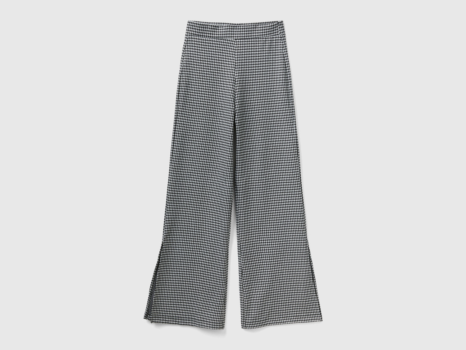Pantaloni jacquard a zampa da donna nero | Benetton Outlet