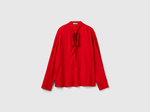 Blusa fluida con lacci