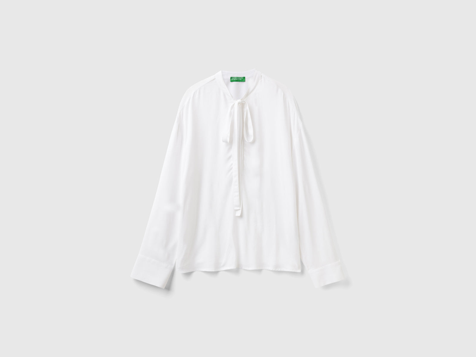 Blusa fluida con lacci da donna bianco | Benetton Outlet