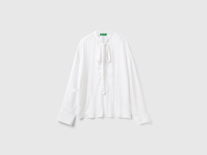 Blusa fluida con lacci