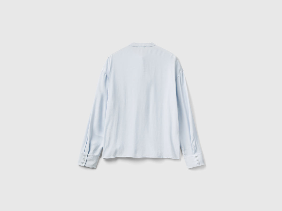 Blusa fluida con lacci