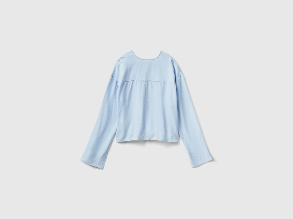 Blusa con scollo a V