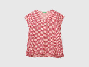 Blusa smanicata stampata
