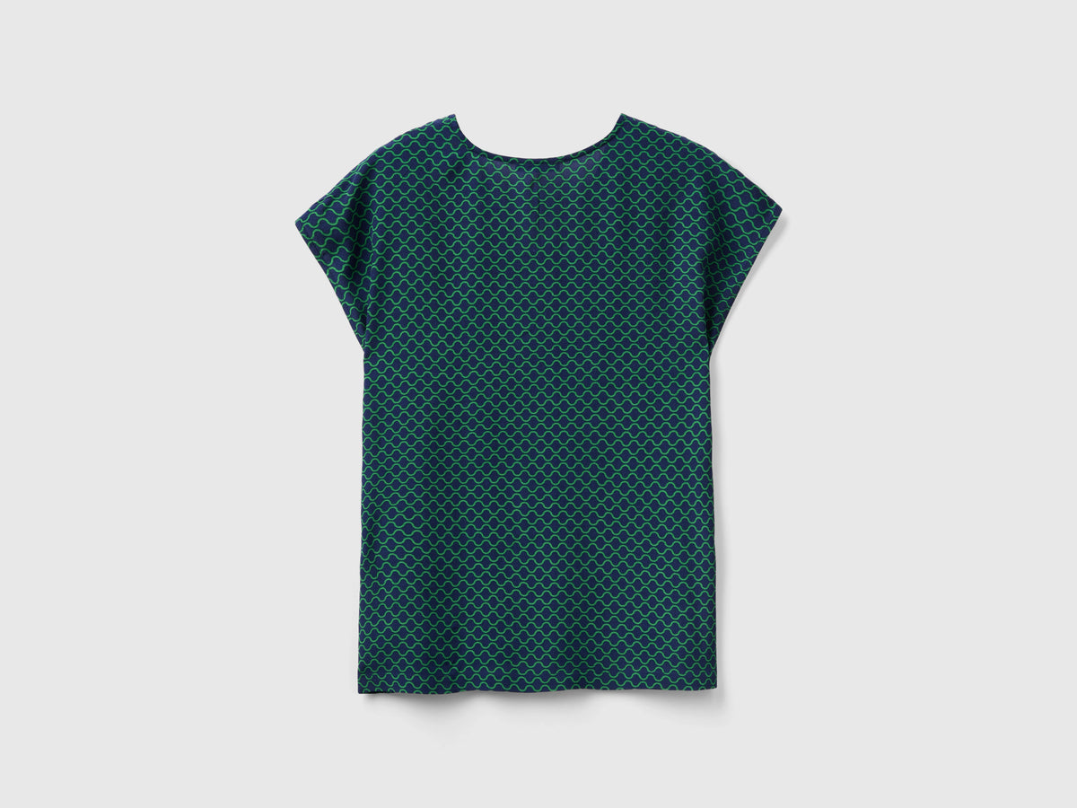Blusa smanicata stampata