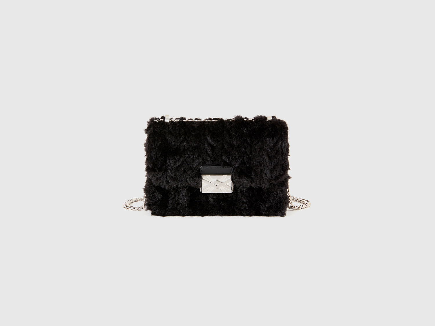 Borsa piccola in pelliccetta sintetica da donna nero | Benetton Outlet
