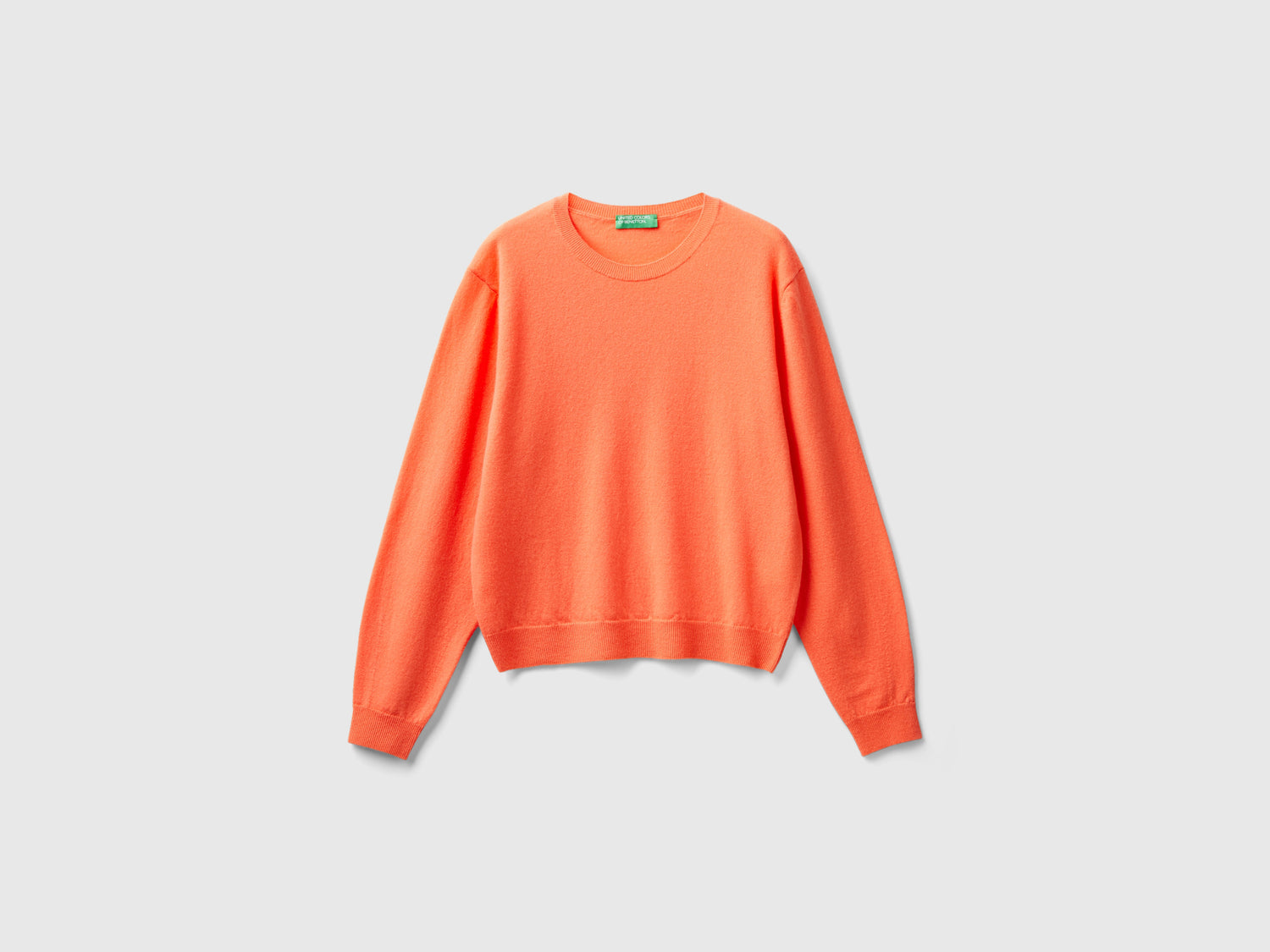 Maglia relaxed fit in pura lana Merino da donna arancione | Benetton Outlet