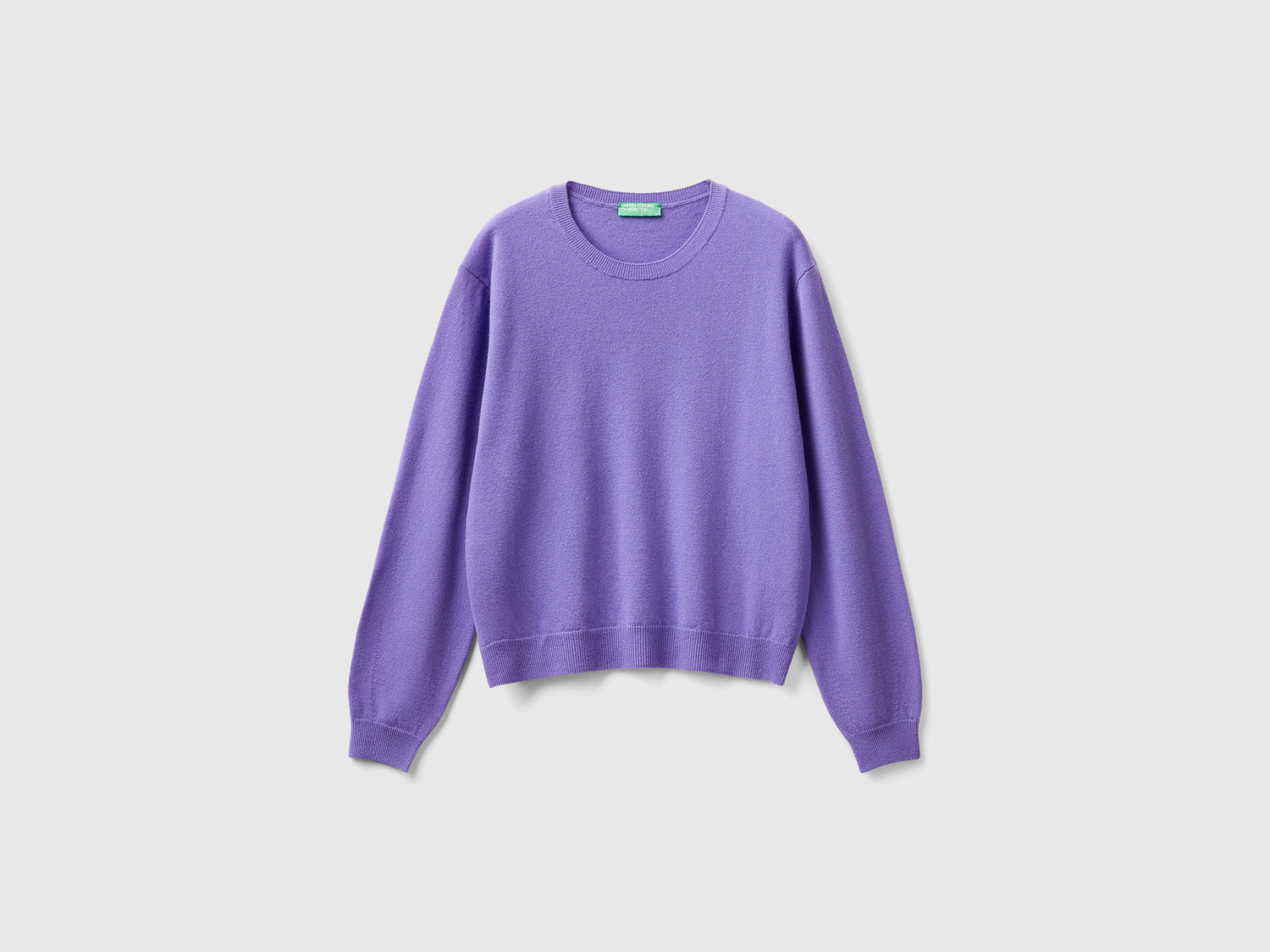 Maglia relaxed fit in pura lana Merino da donna viola | Benetton Outlet