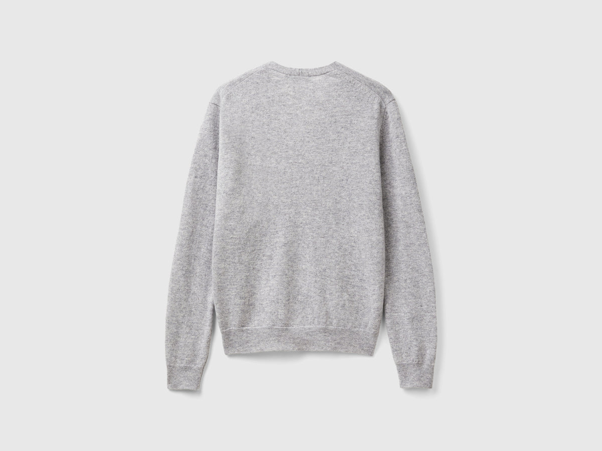 Cardigan scollo a Vo mélange in pura lana Merino