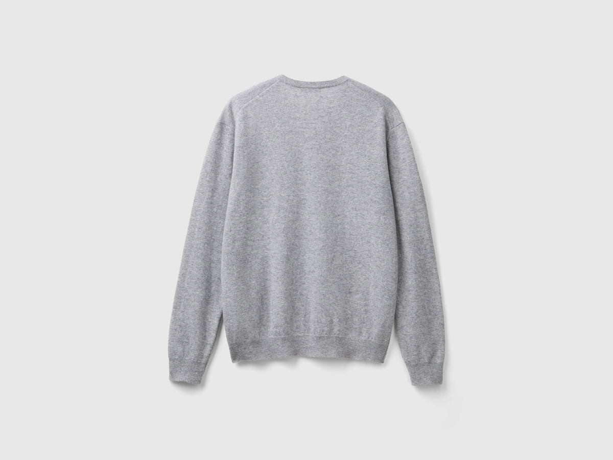 Maglia scollo a Vo mélange in pura lana Merino