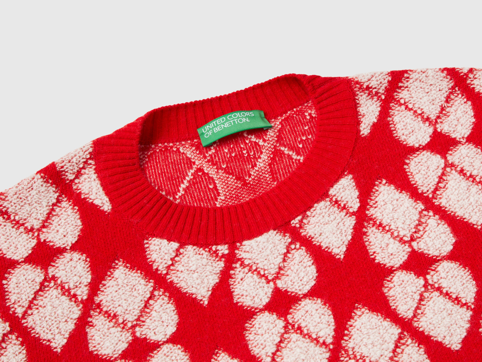Maglione a cuori in misto lana riciclata da donna rosso 3 | Benetton Outlet