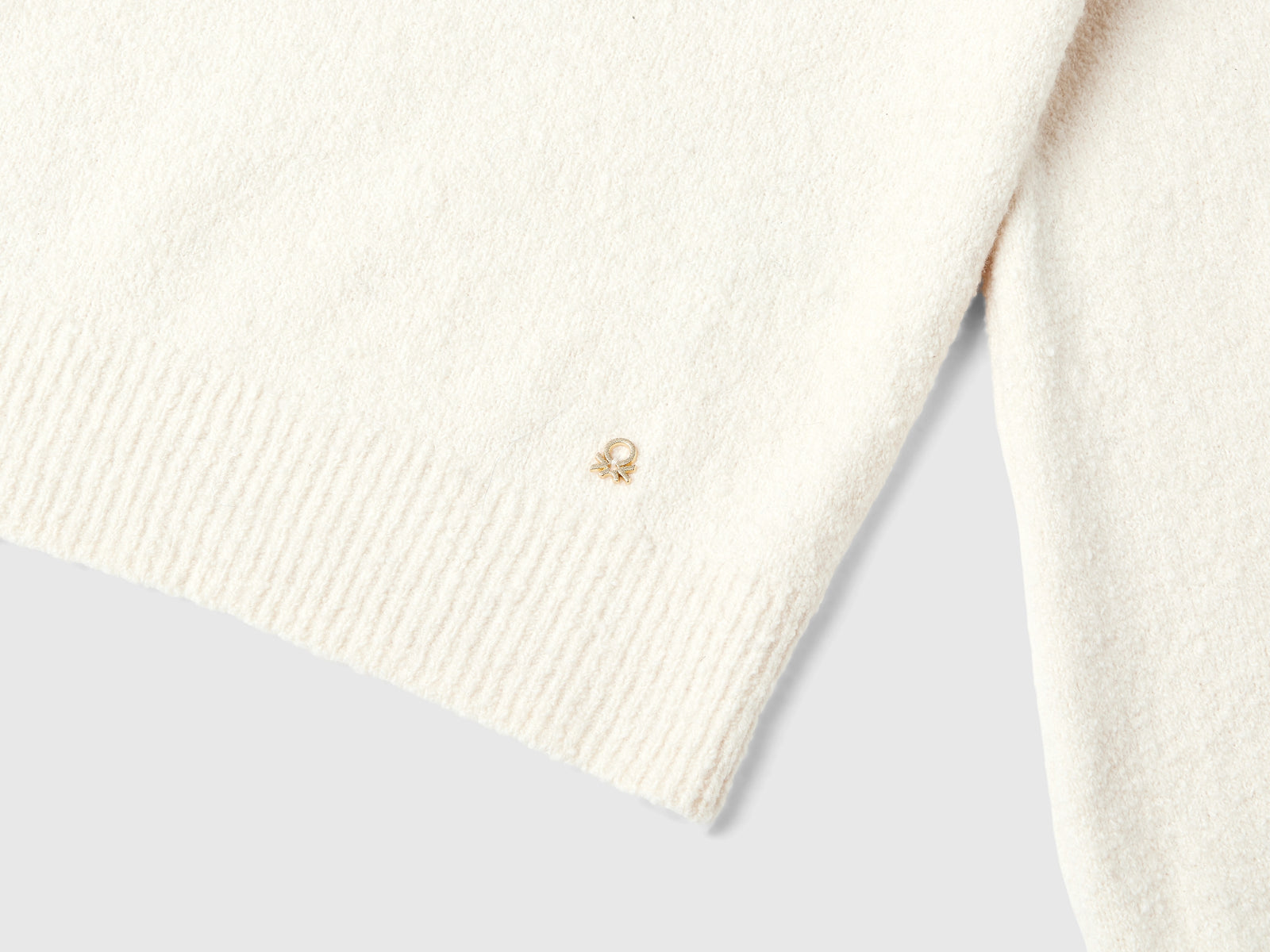 Polo in maglia cropped da donna bianco panna 3 | Benetton Outlet