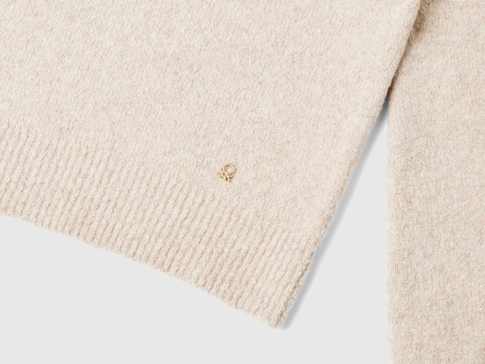 Polo in maglia cropped da donna beige 3 | Benetton Outlet