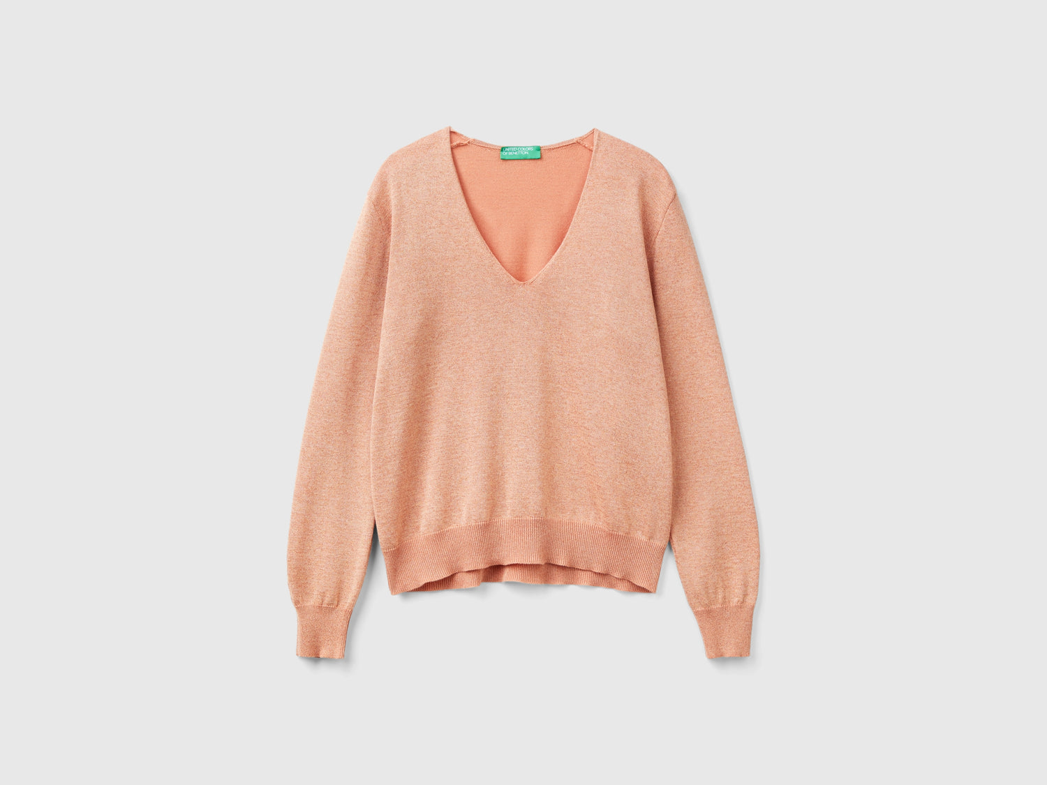 Maglia con scollo a V e lurex da donna pesca | Benetton Outlet