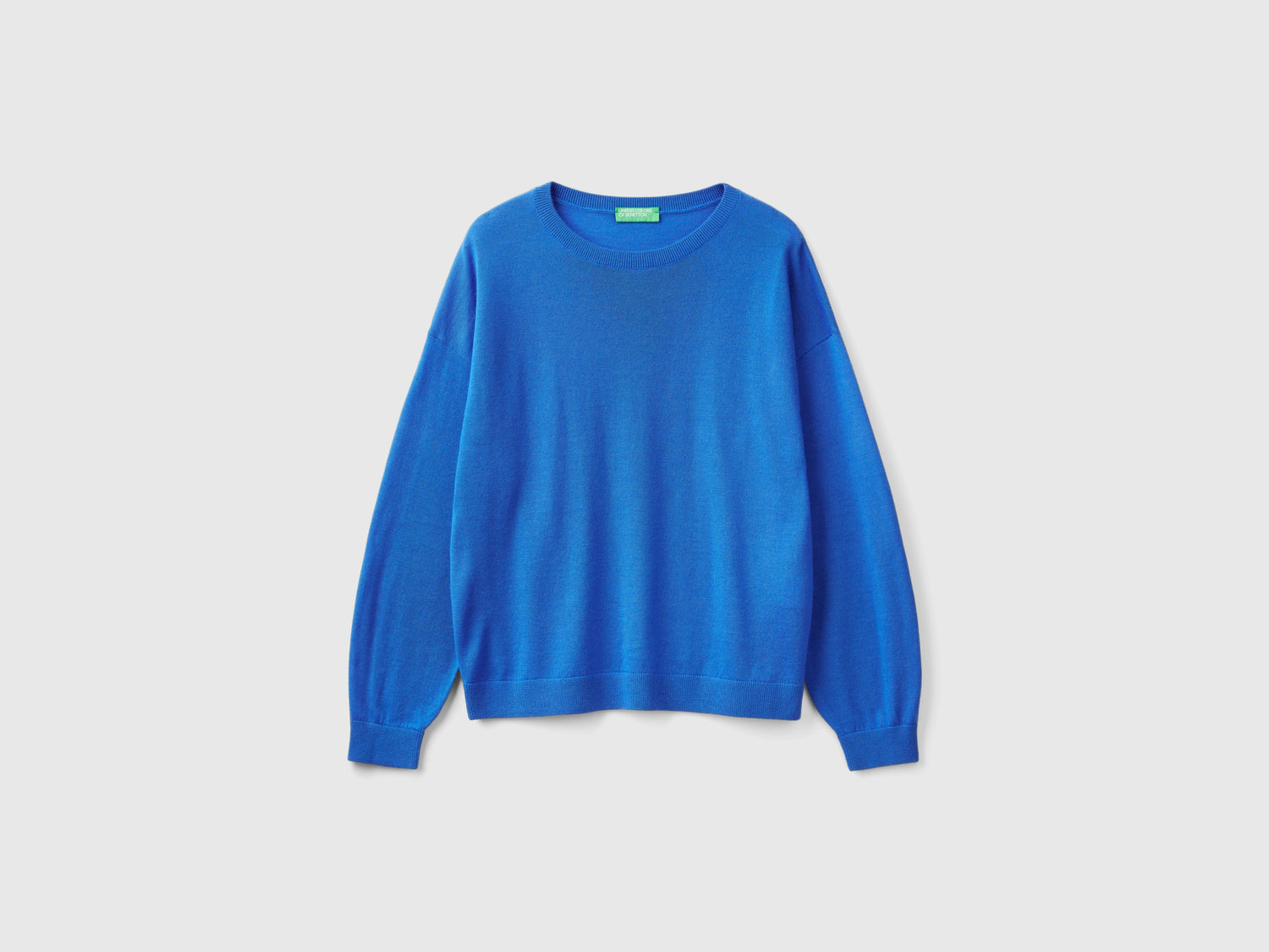 Maglia con scollo a barchetta in pura lana Merino da donna azzurro | Benetton Outlet