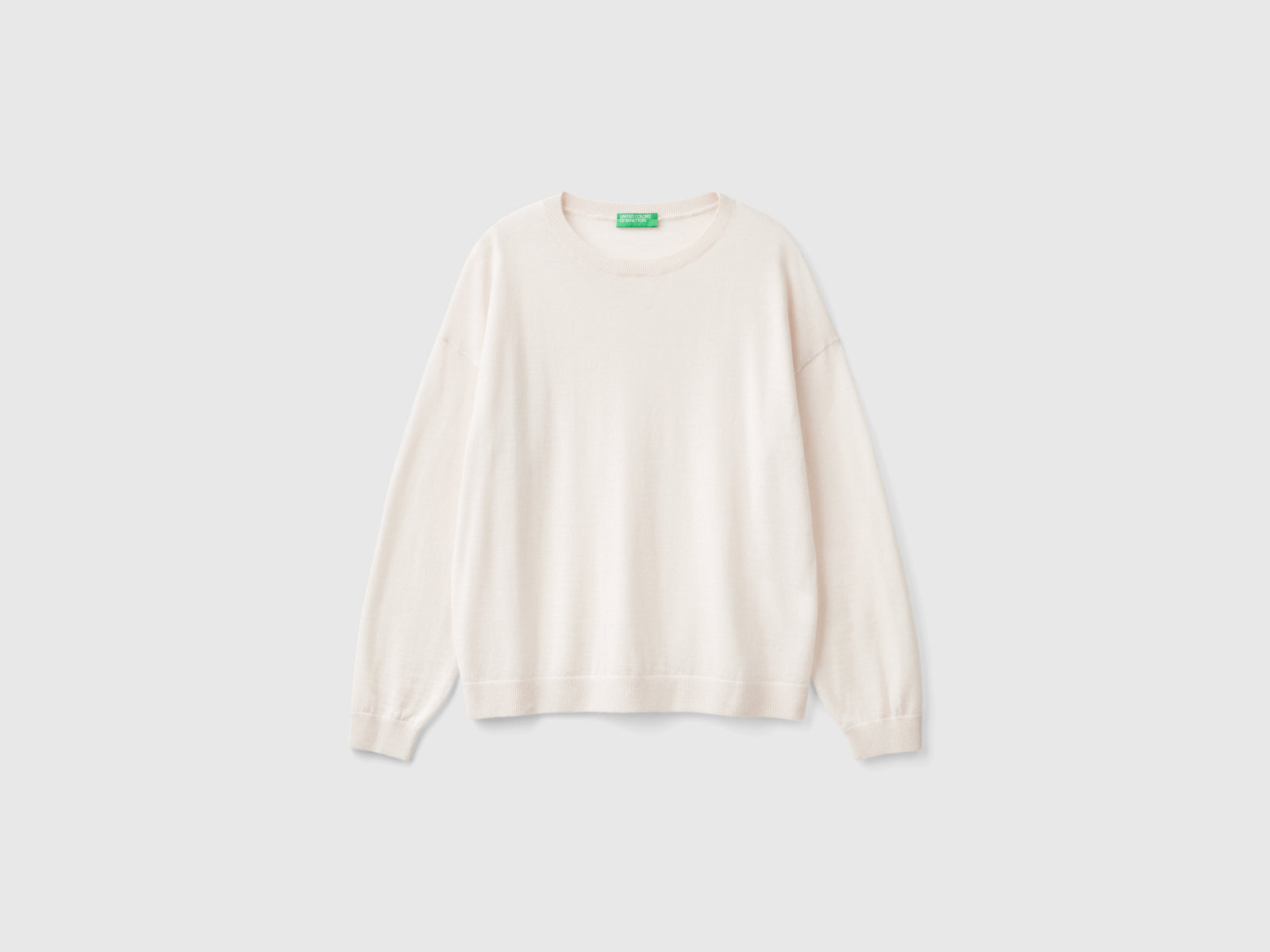Maglia con scollo a barchetta in pura lana Merino da donna bianco panna | Benetton Outlet
