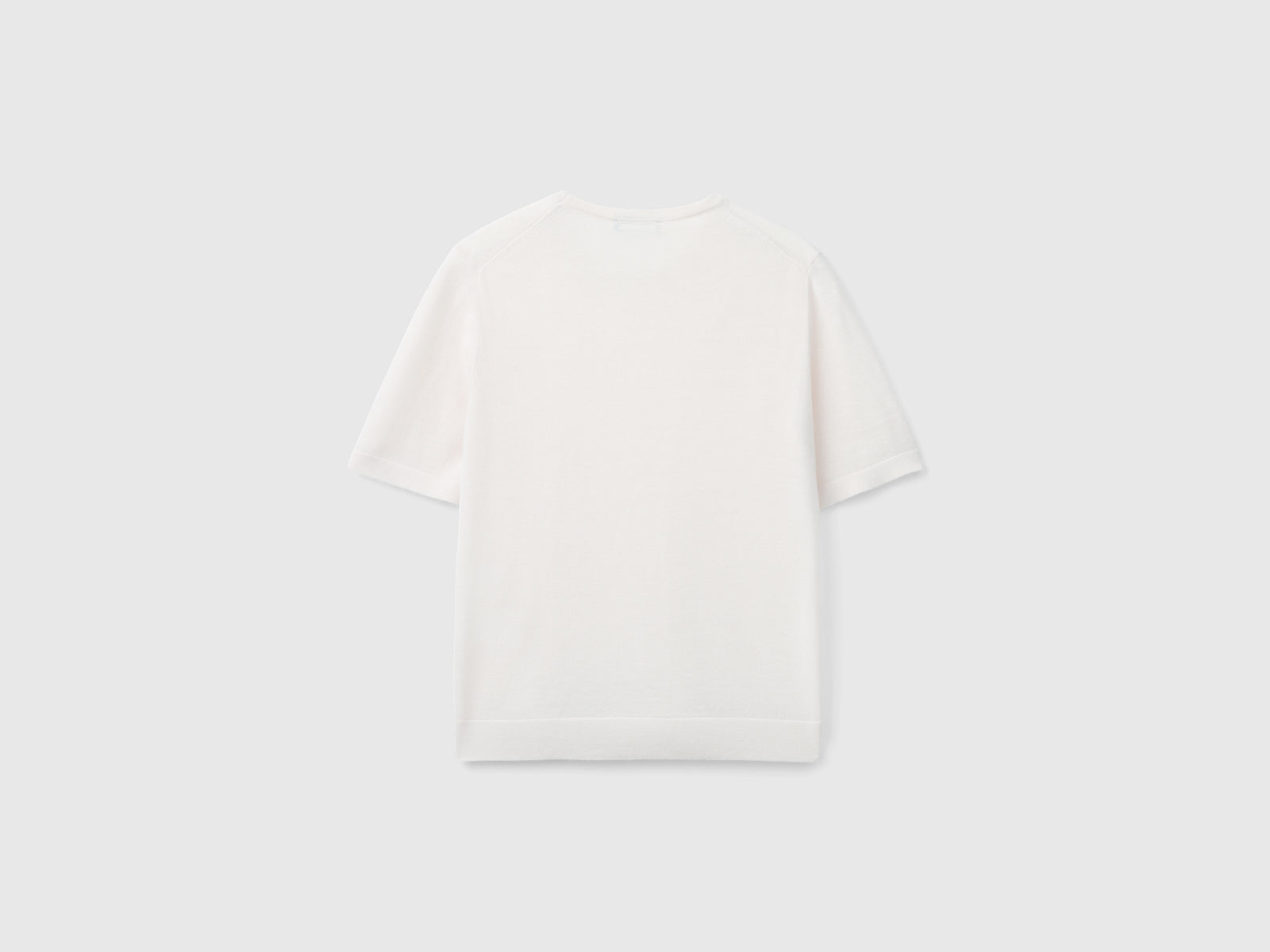 Maglia manica corta in pura lana Merino da donna rosa pastello 2 | Benetton Outlet