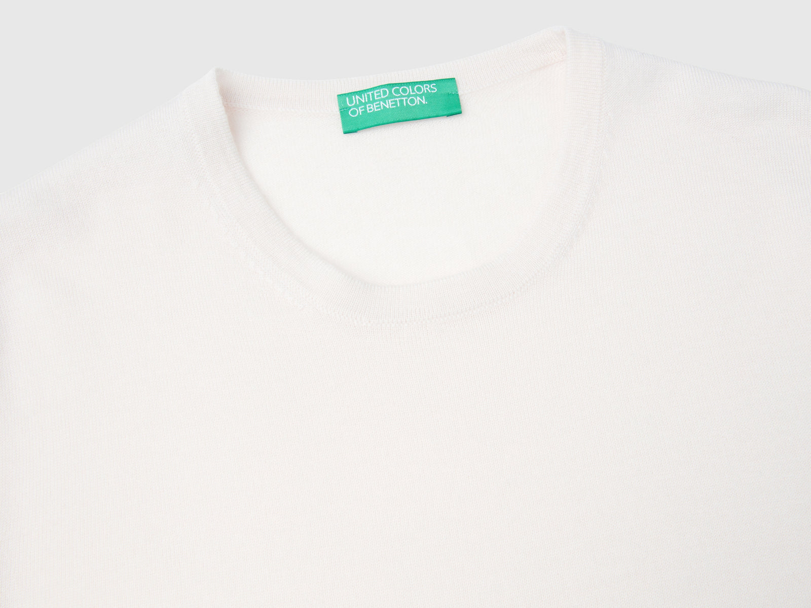 Maglia manica corta in pura lana Merino da donna rosa pastello 3 | Benetton Outlet