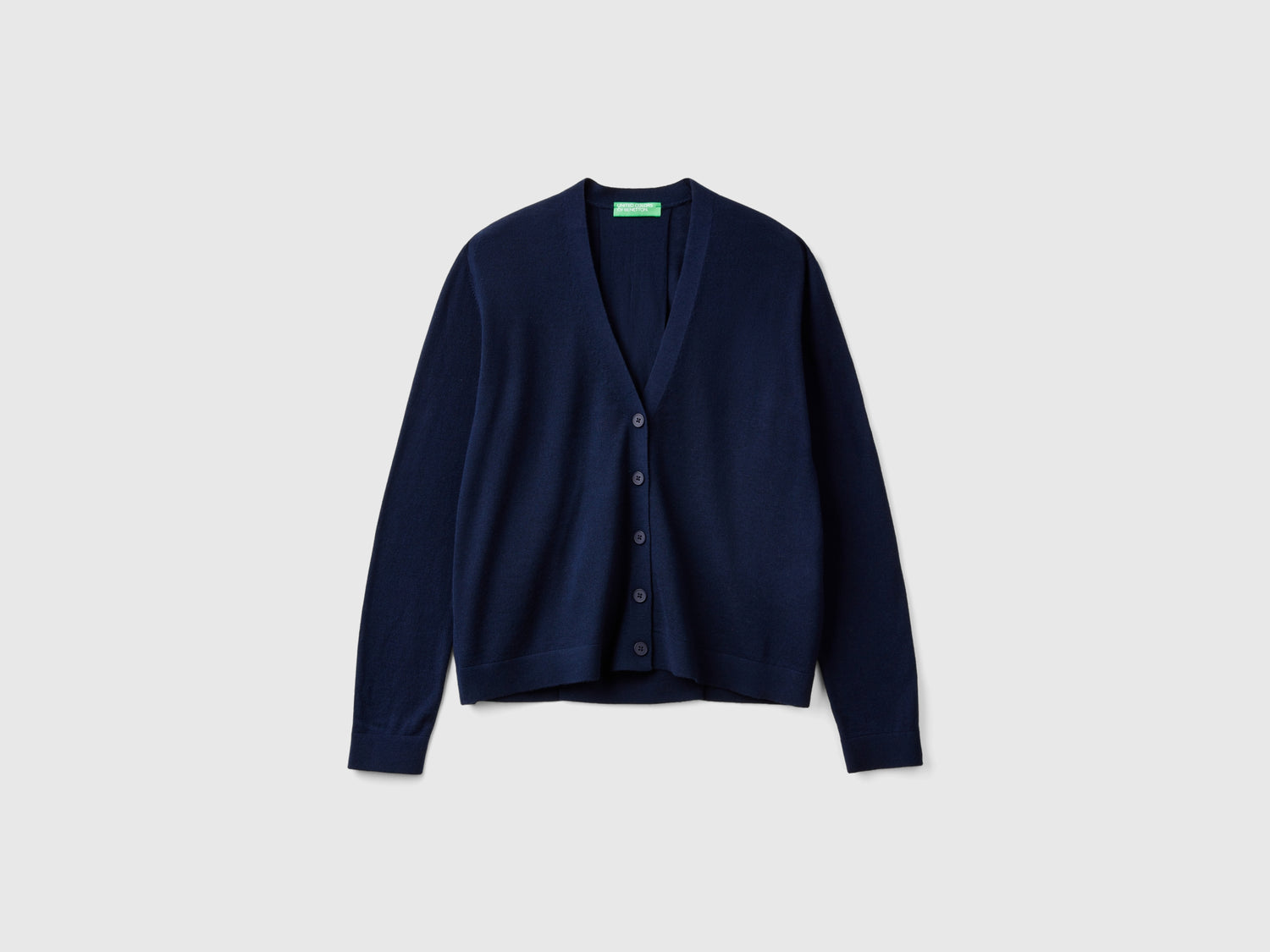 Maglia scollo a V in pura lana Merino da donna blu scuro | Benetton Outlet