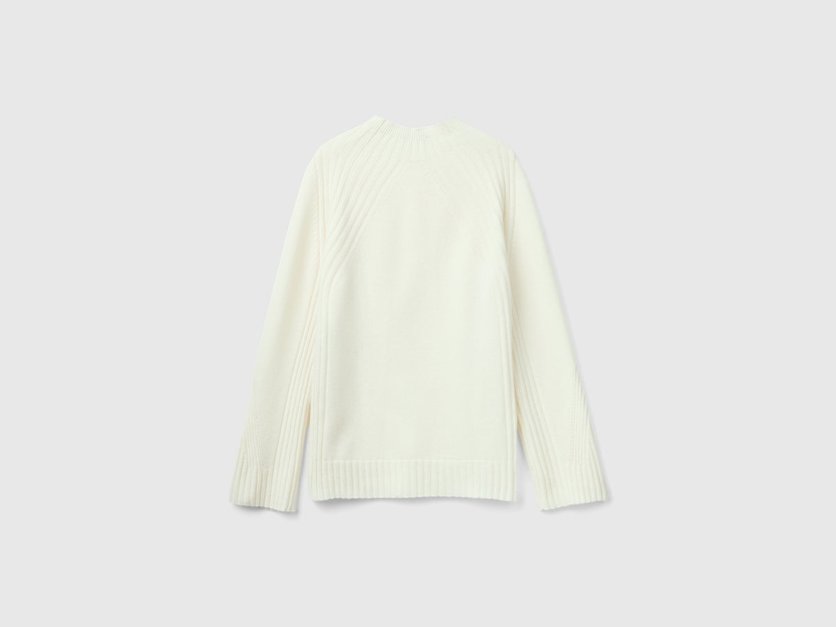 Maglia lupetto con spacchi