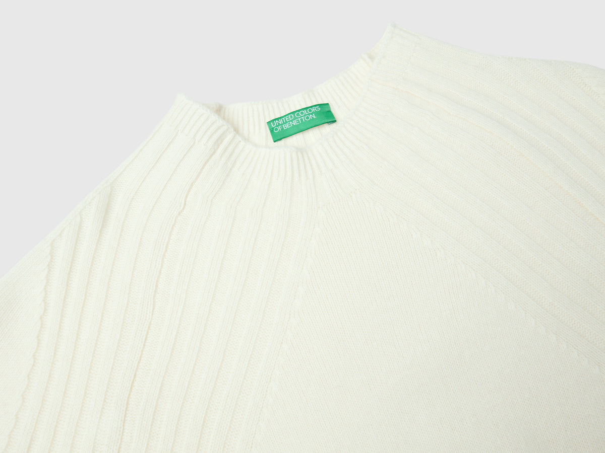 Maglia lupetto con spacchi