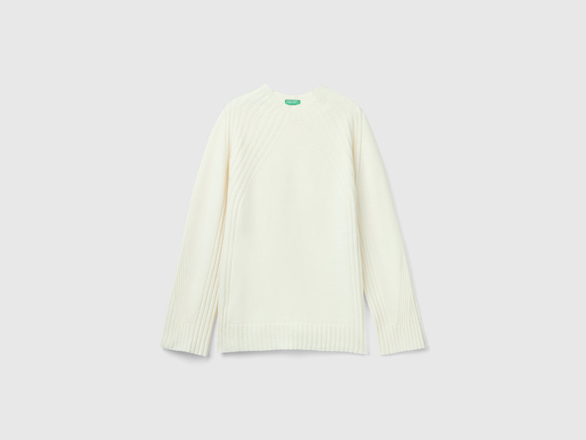 Maglia lupetto con spacchi