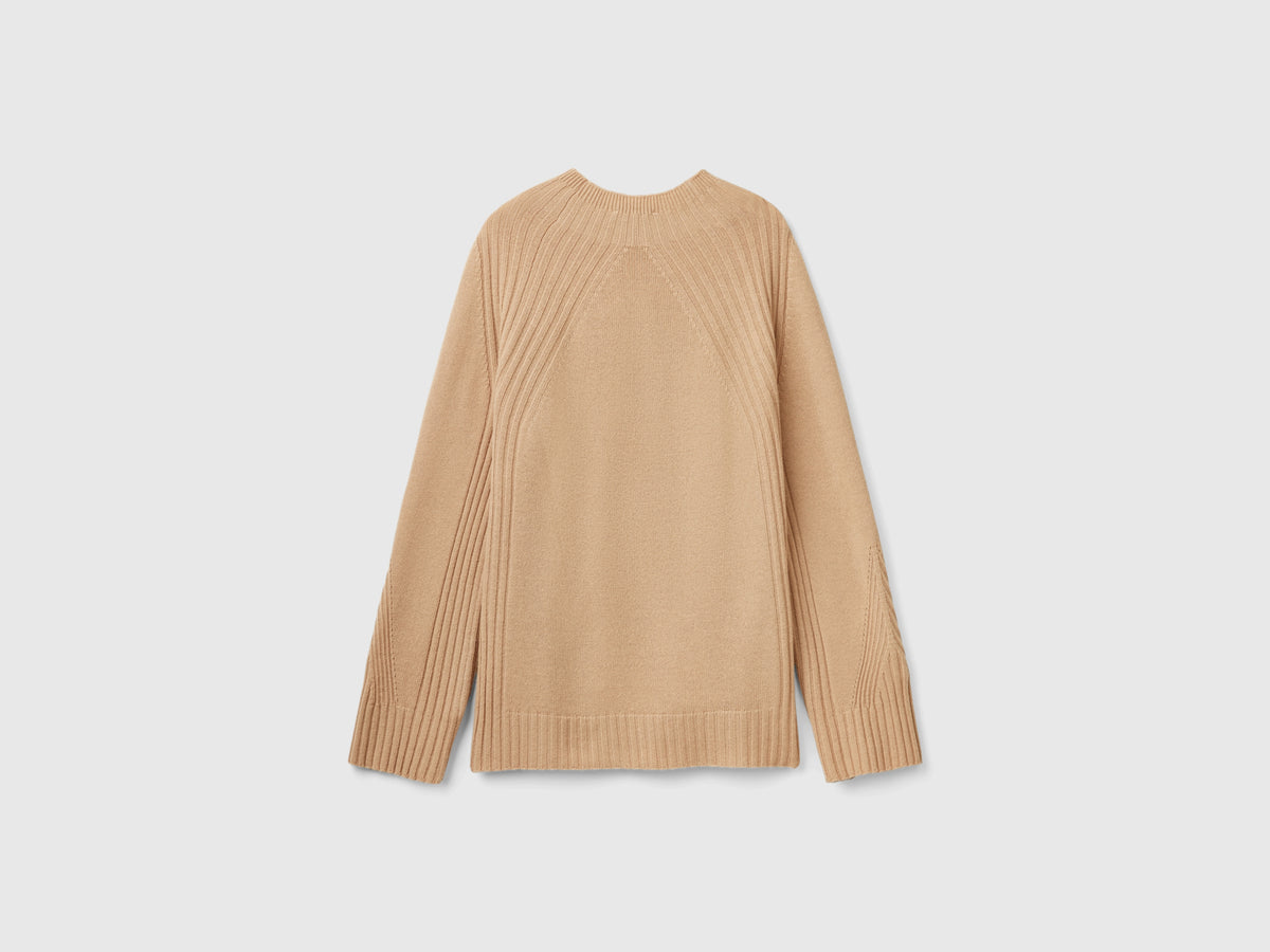 Maglia lupetto con spacchi