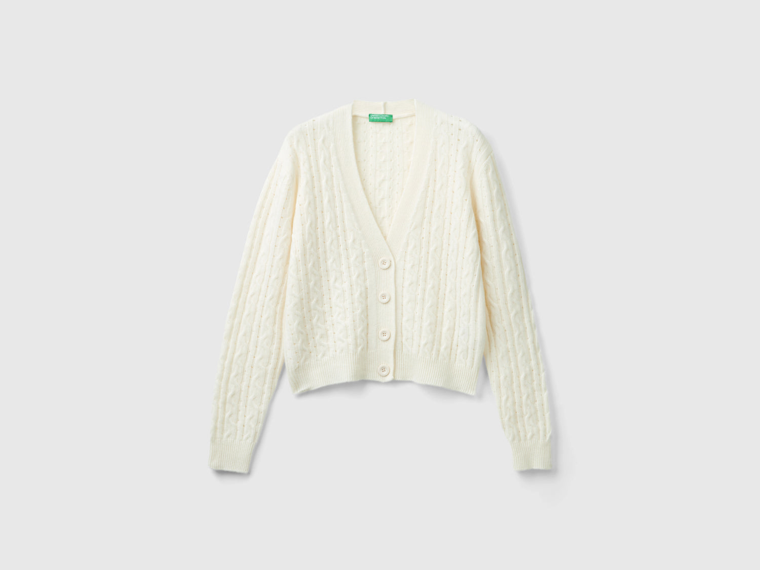 Boxy fit cardigan with cables and openwork da donna bianco panna | Benetton Outlet