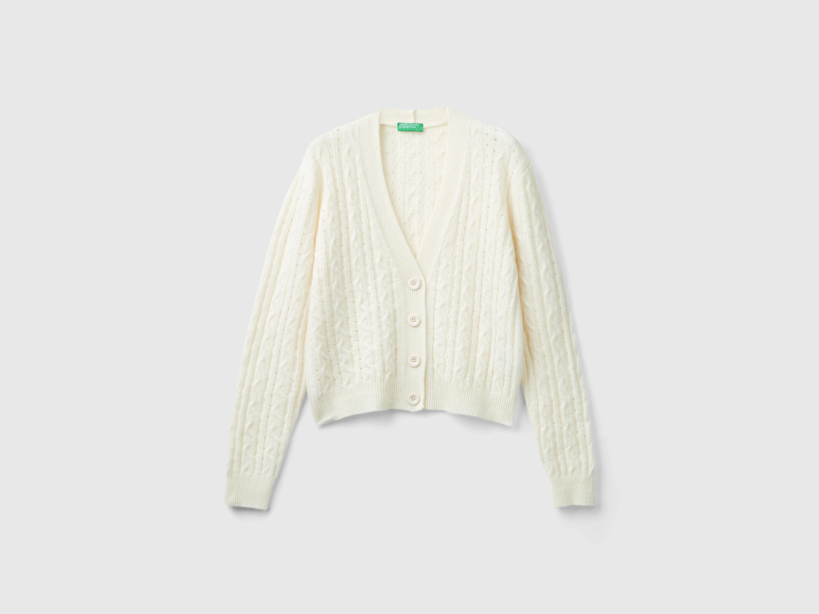 Boxy fit cardigan with cables and openwork da donna bianco panna | Benetton Outlet