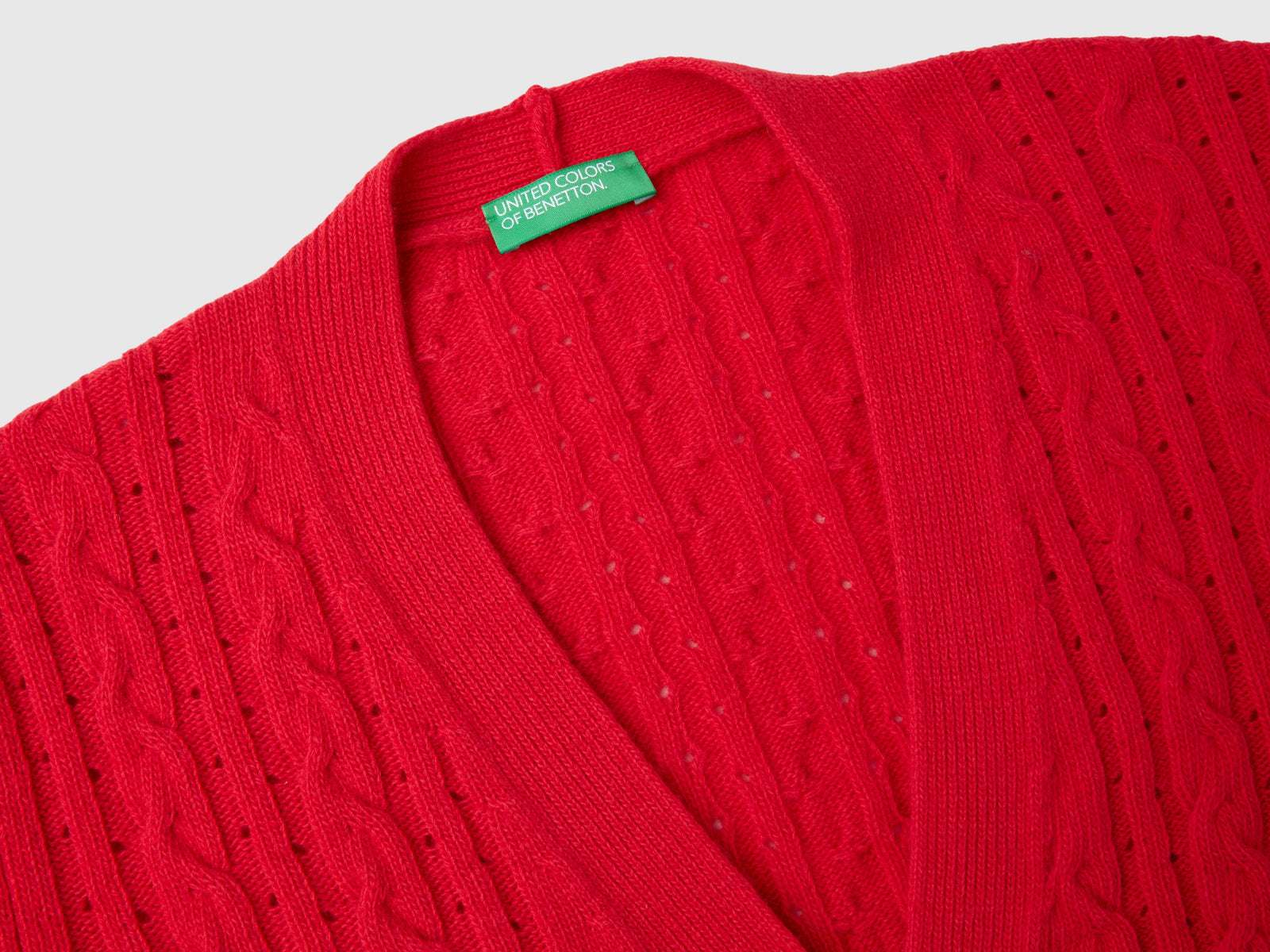 Boxy fit cardigan with cables and openwork da donna rosso 3 | Benetton Outlet