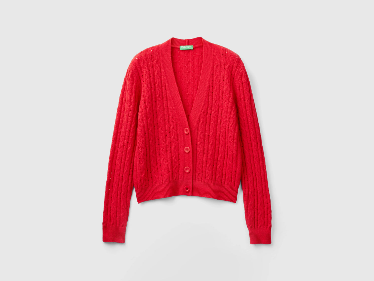 Boxy fit cardigan with cables and openwork da donna rosso | Benetton Outlet
