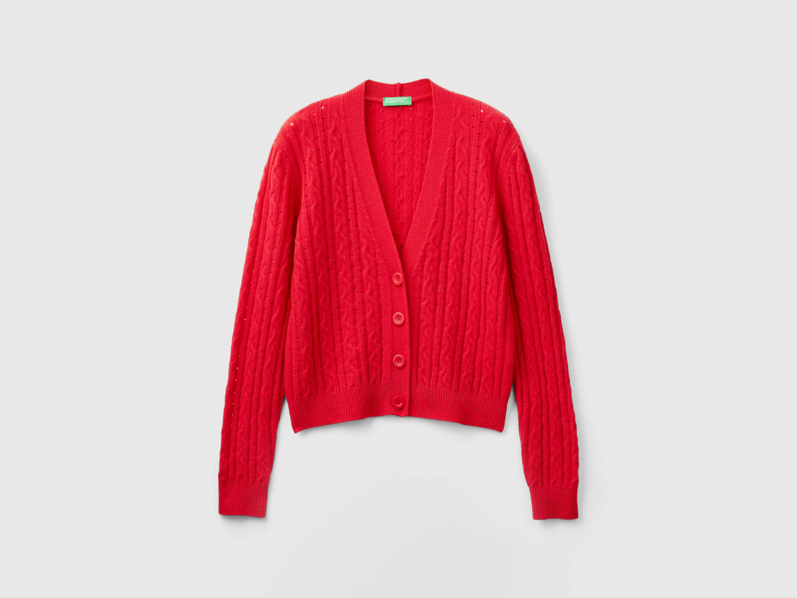 Boxy fit cardigan with cables and openwork da donna rosso | Benetton Outlet