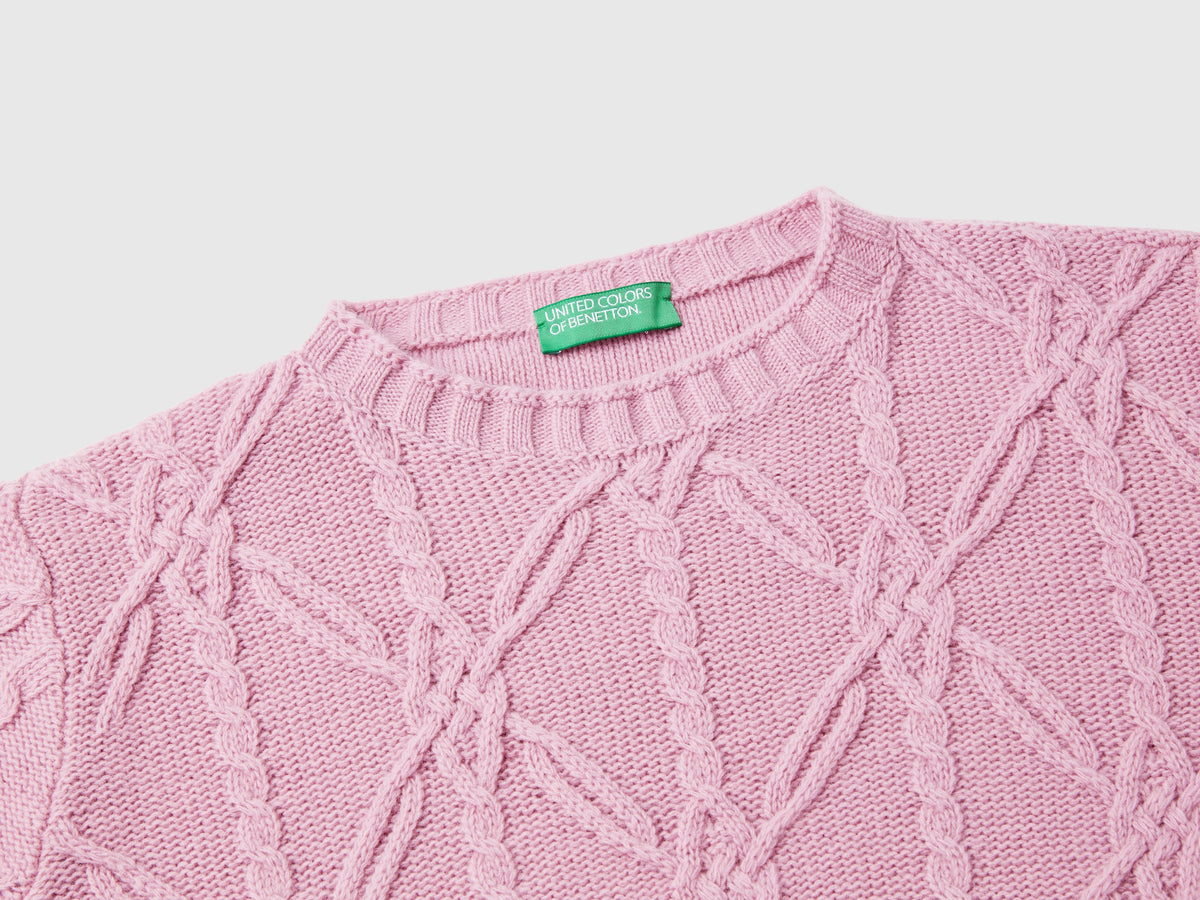 Sweater with woven details
