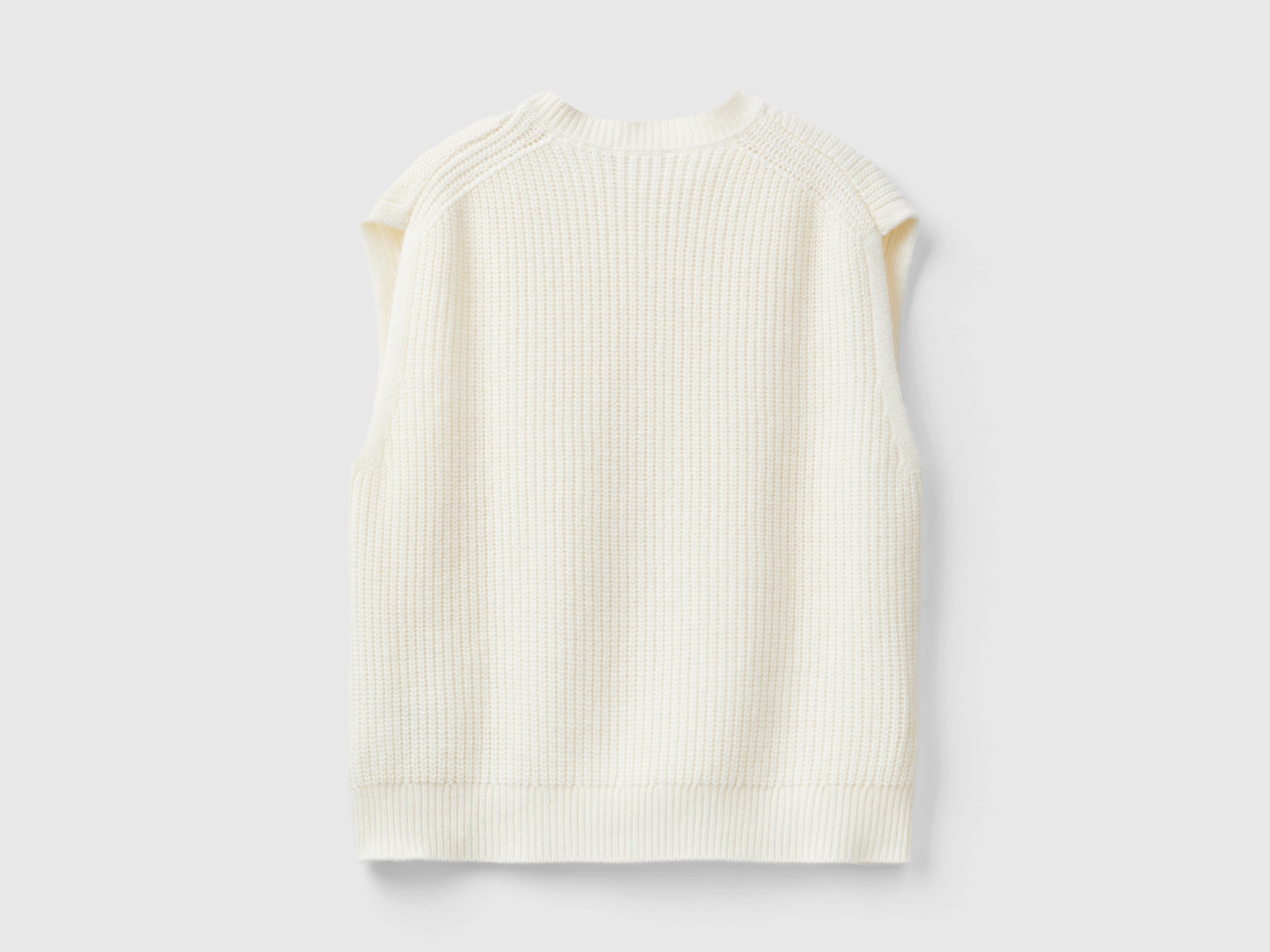 Gilet con trecce da donna bianco panna 2 | Benetton Outlet
